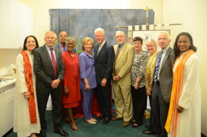 Former President Bill Clinton, center, and his wife, Hillary Clinton, stand with members of the bicentennial committee at Foundry UMC on Sept. 13. 